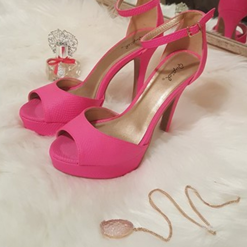 Neon pink snake heels by Qupid